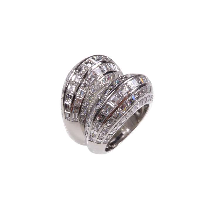 Pair of diamond and platinum bombe rings by Van Cleef and Arpels